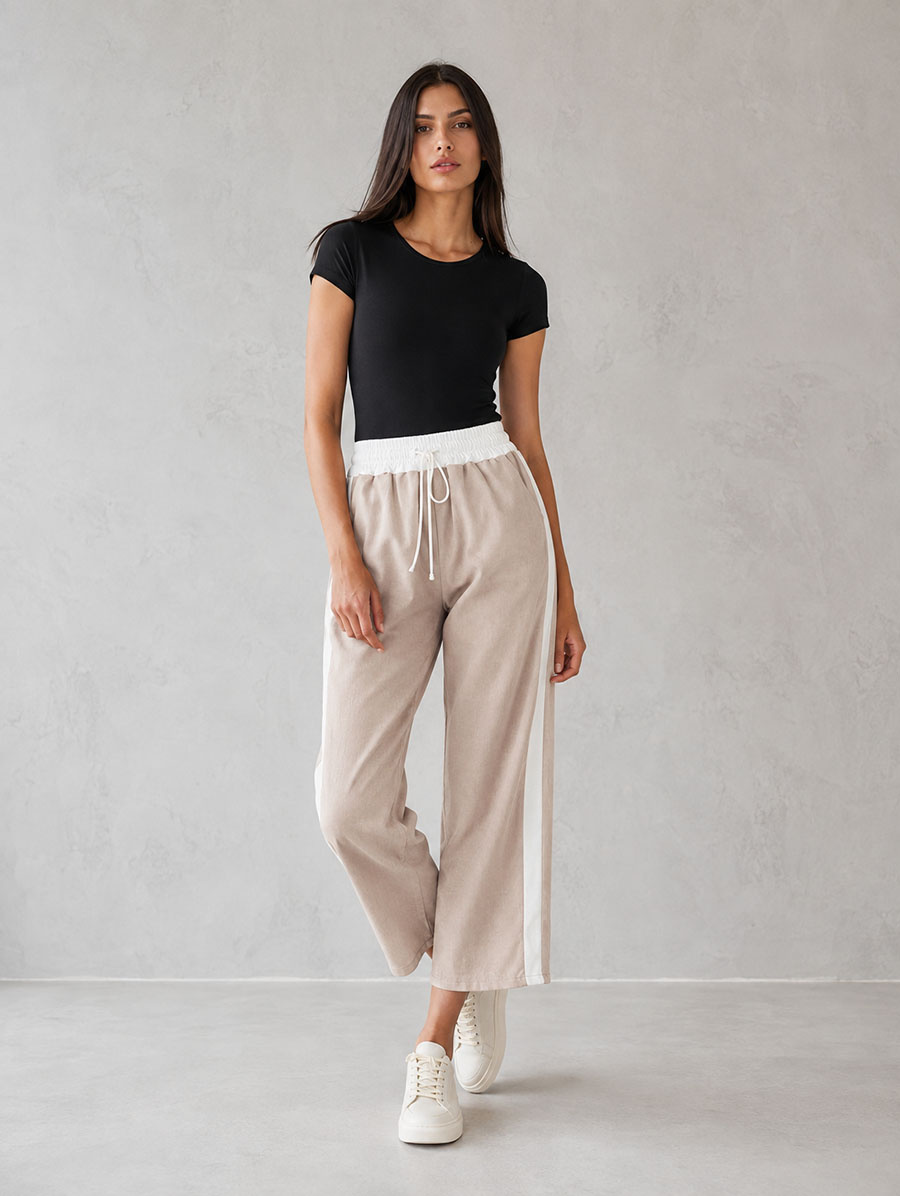 Pantaloni pentru femei de culoare bej închis, cu croi larg