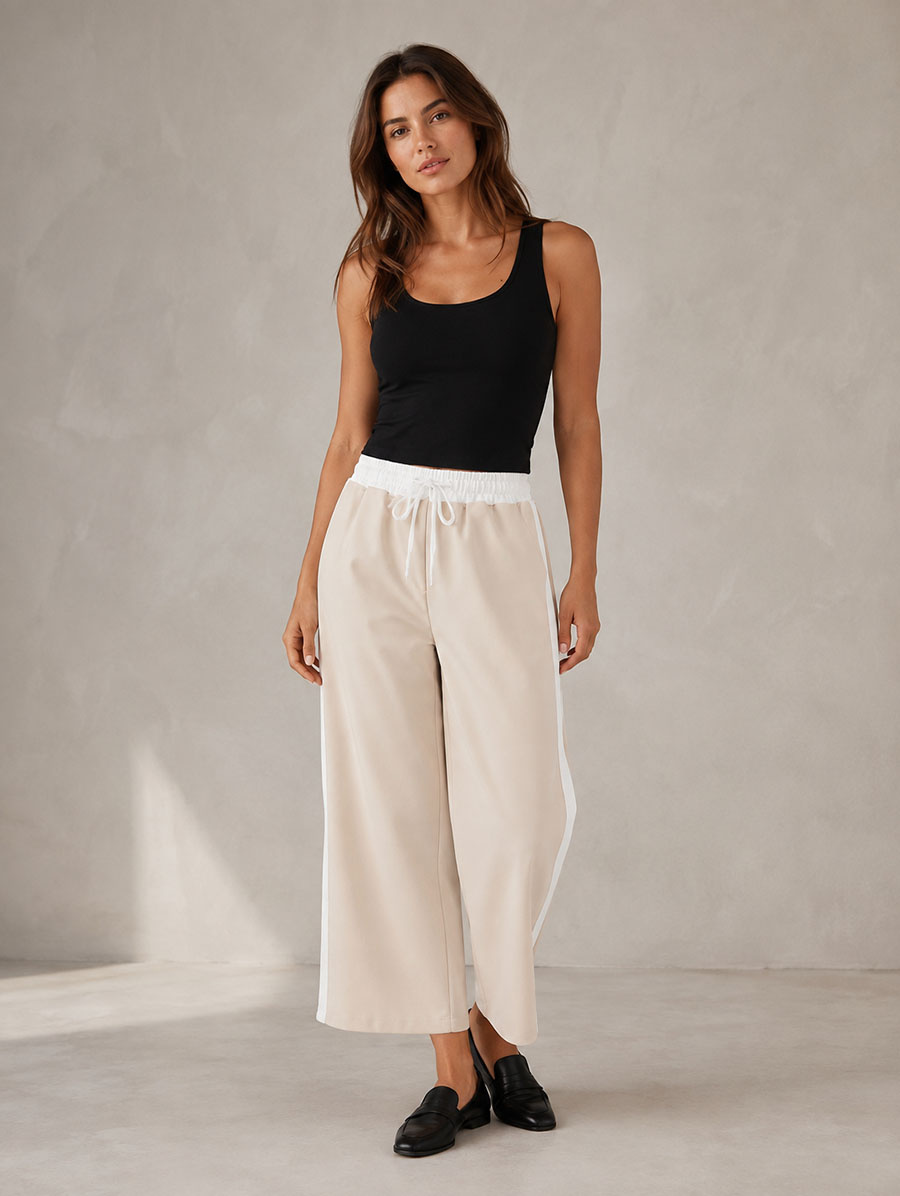 Pantaloni pentru femei de culoare bej deschis, cu croi larg