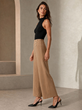 Pantaloni eleganți pentru femei, de culoare caramel, cu nasturi aurii