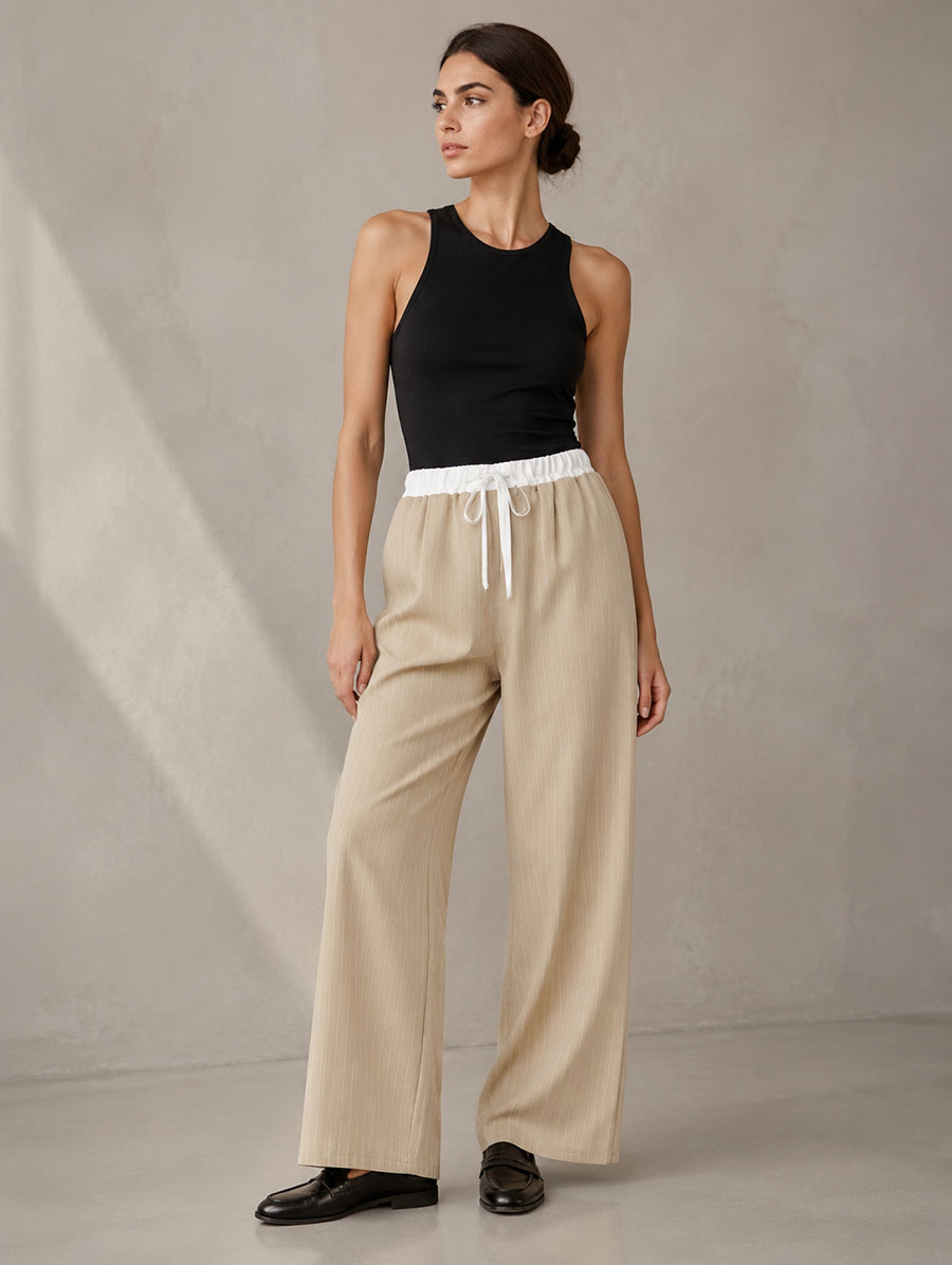 Pantaloni pentru femei de culoare bej închis, cu croi larg