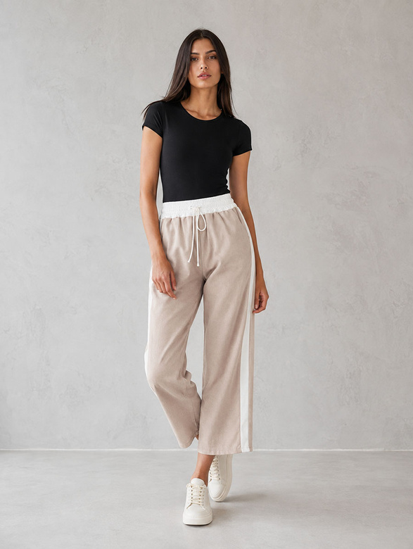 Pantaloni pentru femei de culoare bej închis, cu croi larg
