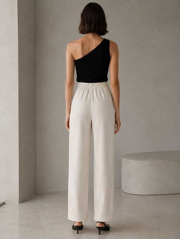 Pantaloni eleganți pentru femei, de culoare bej deschis, cu nasturi aurii