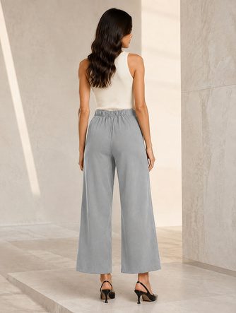 Pantaloni eleganți gri pentru femei, cu nasturi aurii