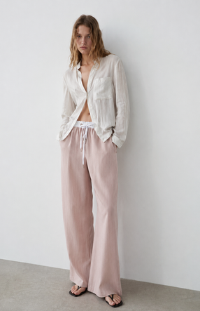 Pantaloni pentru femei de culoare bej deschis, cu croi larg