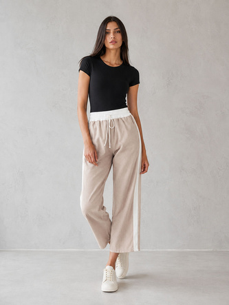 Pantaloni pentru femei de culoare bej închis, cu croi larg