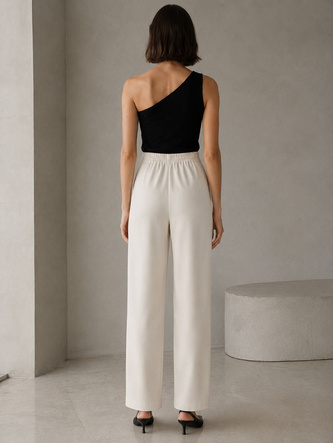 Pantaloni eleganți pentru femei, de culoare bej deschis, cu nasturi aurii